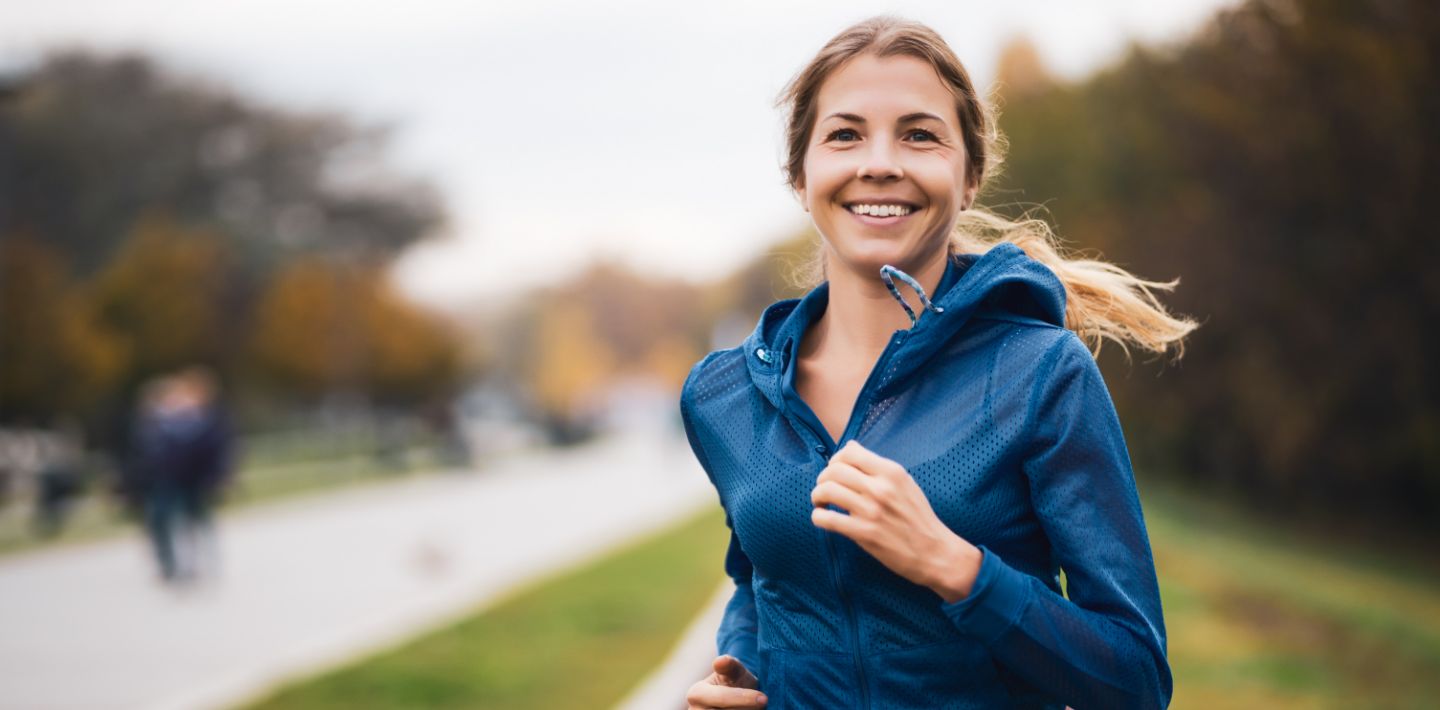 smiling person running