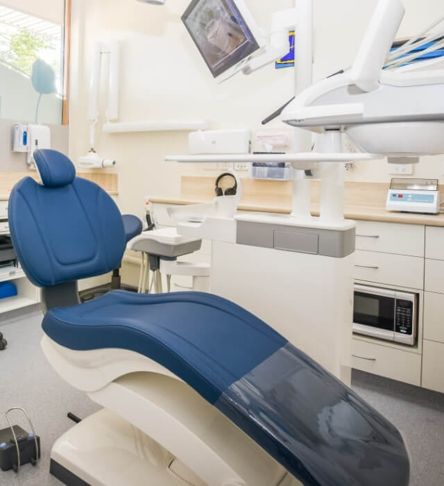 Dental chair in room
