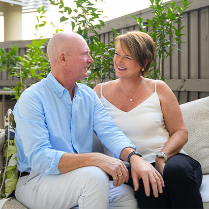 Dr. Luke looking at wife