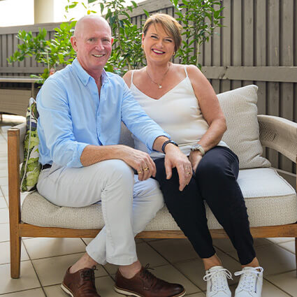 Dr. Luke with wife outside