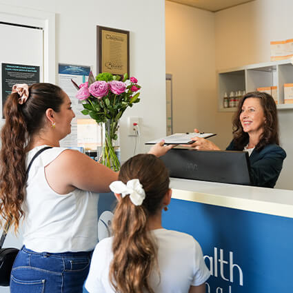 handing forms to receptionish