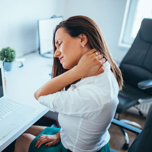 Woman at work with neck pain