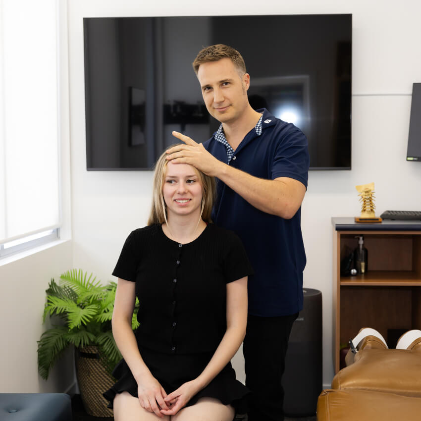 Adjusting woman's head