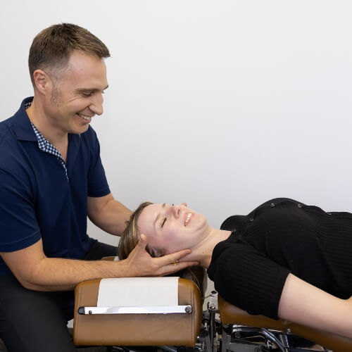 patient having neck adjusted