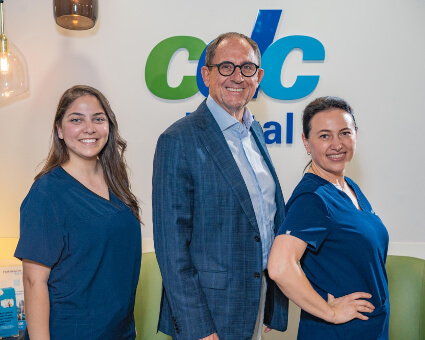 CDC Dental staff standing in patient waiting room