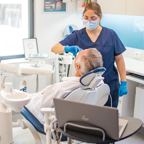Dentist checking patient