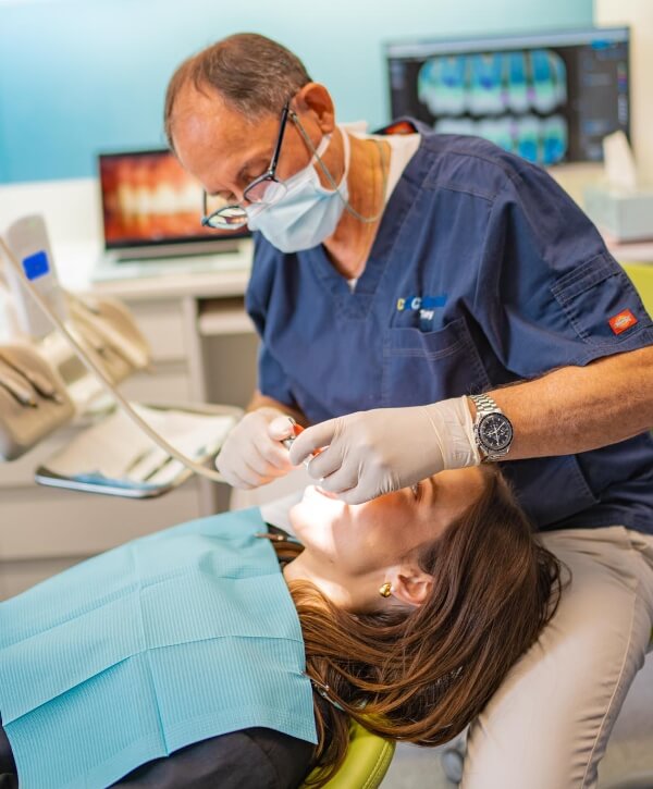 Dr. Tony checking patient