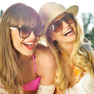 Teen girls wearing sunglasses