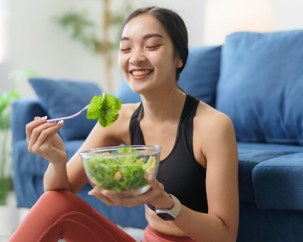 Woman eating a salad