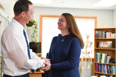 Dr. Schiller greeting patient