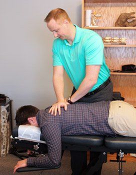 Our techniques vary to meet each patients' unique needs. Dr. Jon adjusting a patient.