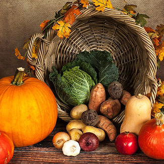 a basket of fall vegetables