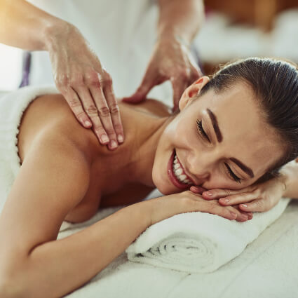 Female patient receiving a shoulder massage