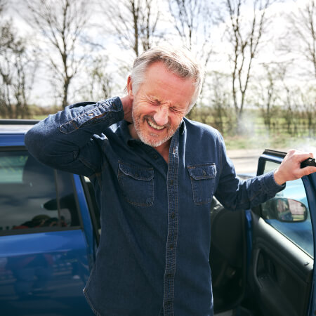 Man with neck pain after car accident