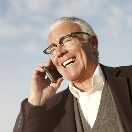 mature man talking on mobile phone