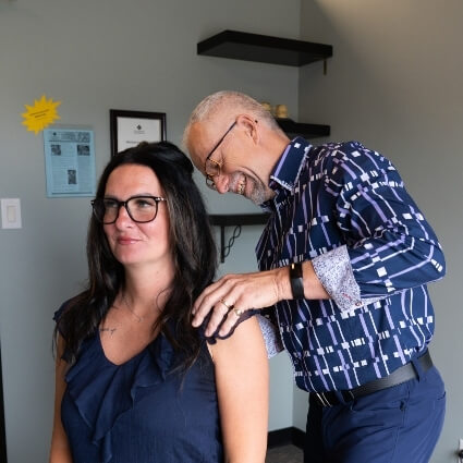 Dr Trevor adjusting patients back