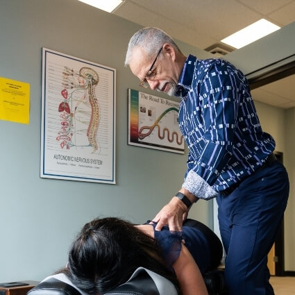 Dr Trevor adjusting patients back