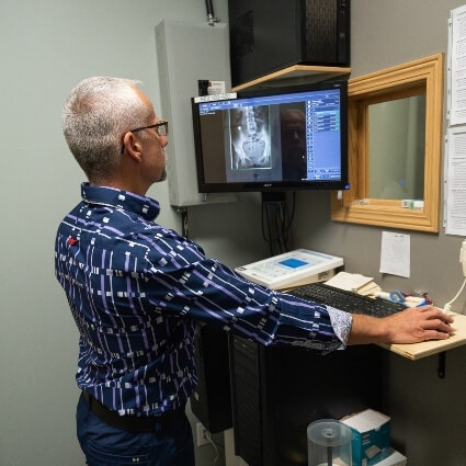 Steinbach chiropractor Dr Trevor reviewing xrays