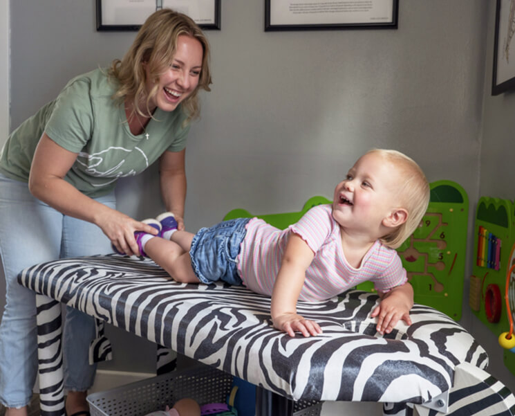 Wausau chiropractor Dr Melissa adjusting baby