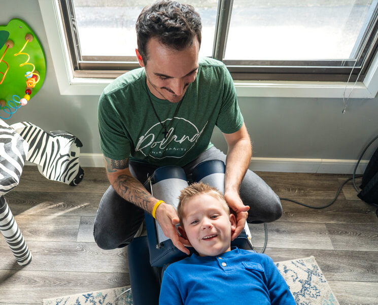 Wausau chiropractor adjusting patient