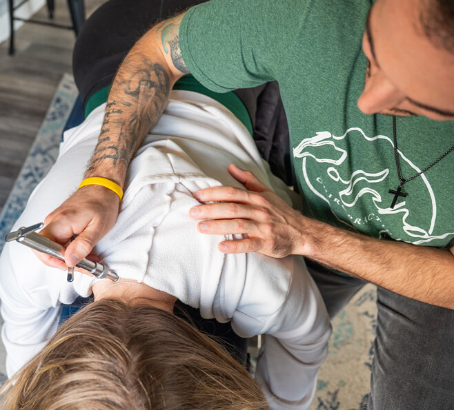 child being adjusted with activator tool