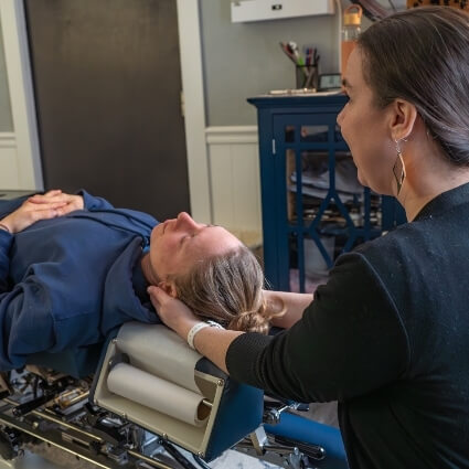 patient having neck adjusted