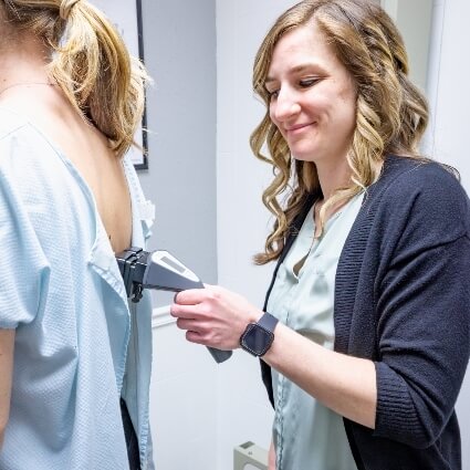 our team scanning patients back