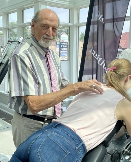 Aurora patient receiving a chiropractic adjustment