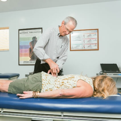 Anaheim chiropractor Dr. Majer using chiropractic tool