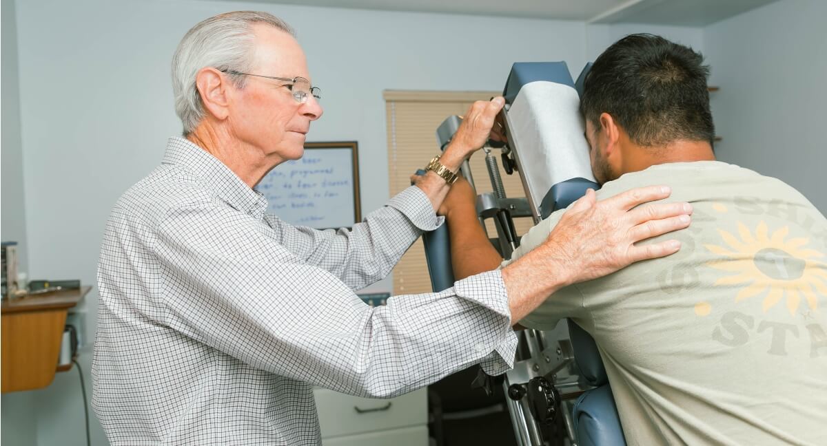 Anaheim chiropractor Dr. Majer with male patient