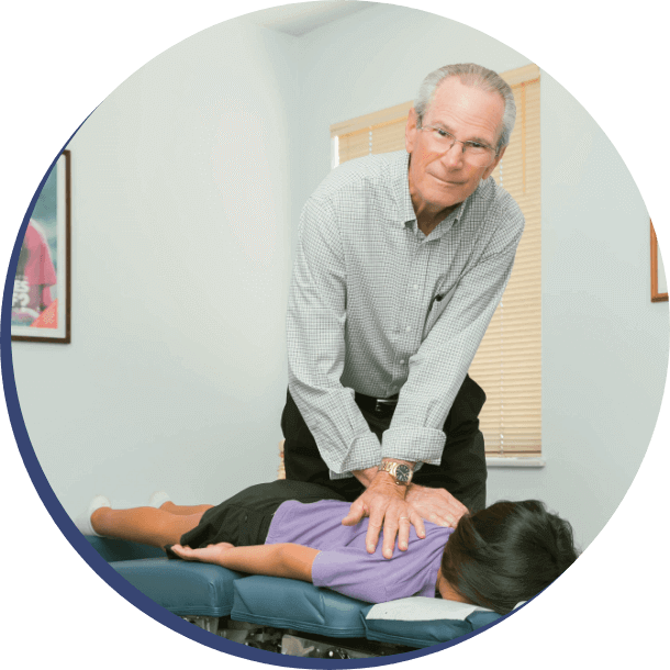 Anaheim chiropractor Dr. Majer adjusting pediatric patient