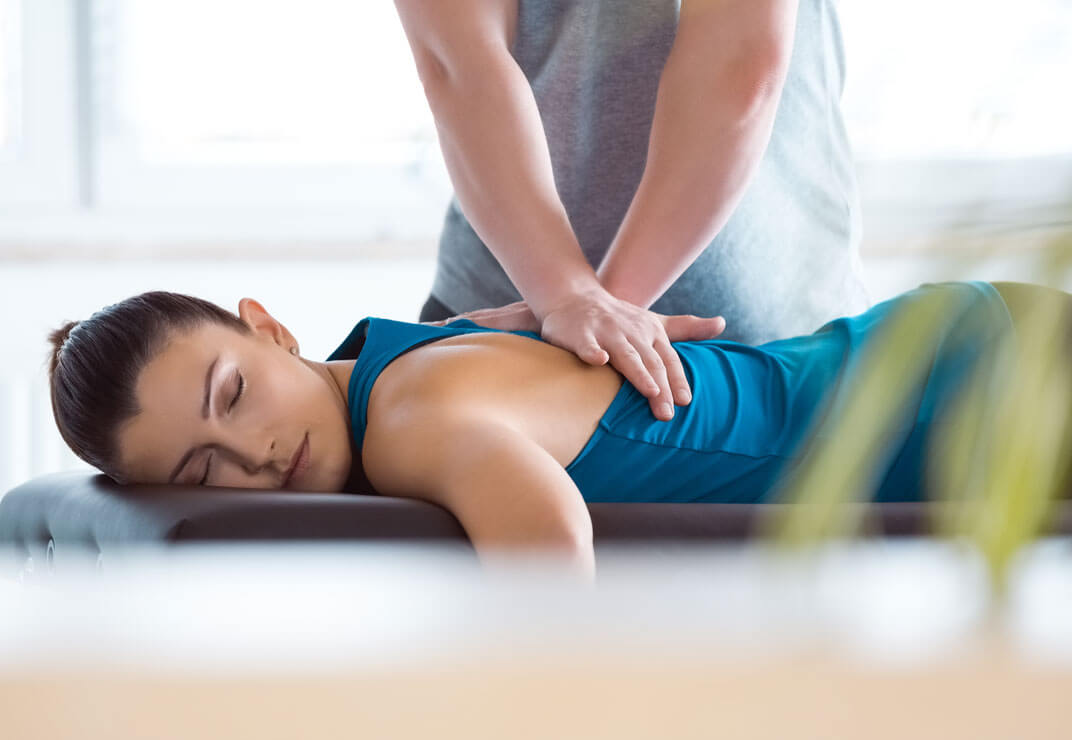 woman getting chiropractic adjustment