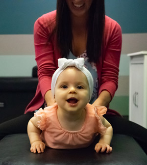 Infant receiving an adjustment