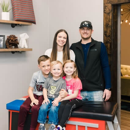 Family in adjusting room