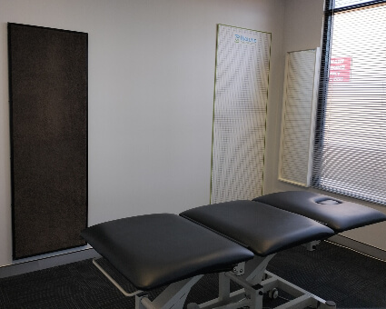 Biotune Chiropractic adjusting room with table