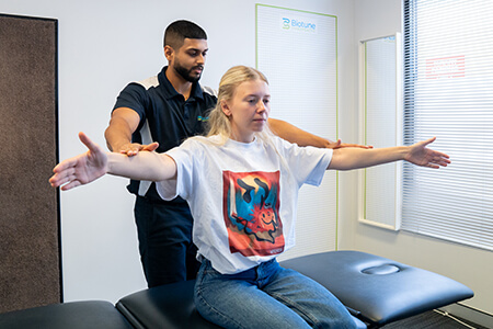 Dr Aneesh adjusting patient
