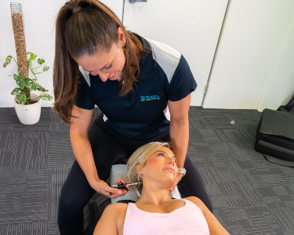 Dr Jill doing neck adjustment