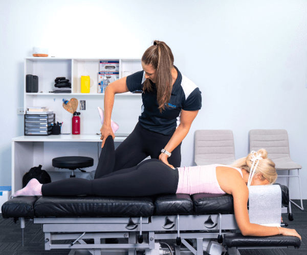Chiropractor with female patient