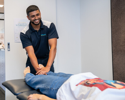 Holding patient's foot