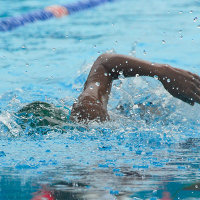 person swimming in a pool