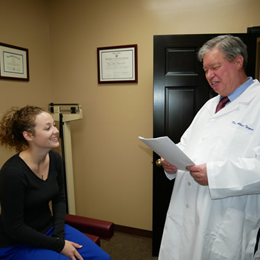 Dr. Teague with female patient