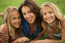 Dr. Nancy and her twin daughters