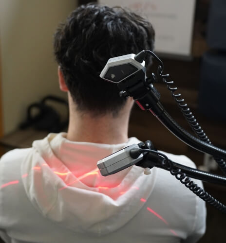 laser therapy on patient's neck