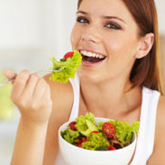 woman eating salad