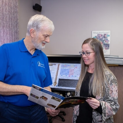 Dr Phillip talking with a patient