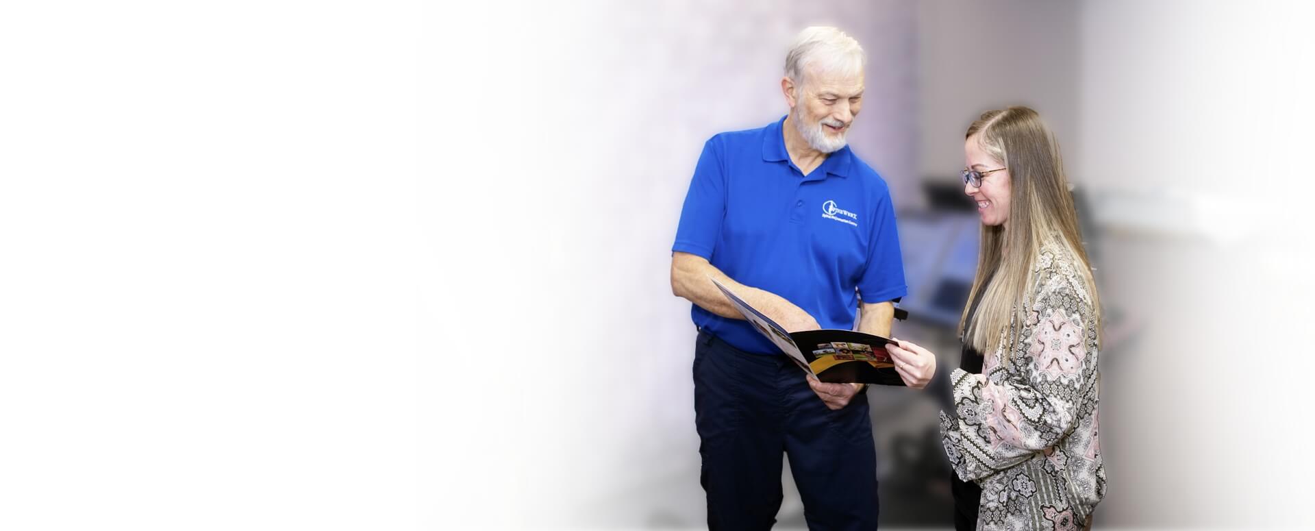 Lindsay chiropractor Dr Croutch showing patient a booklet