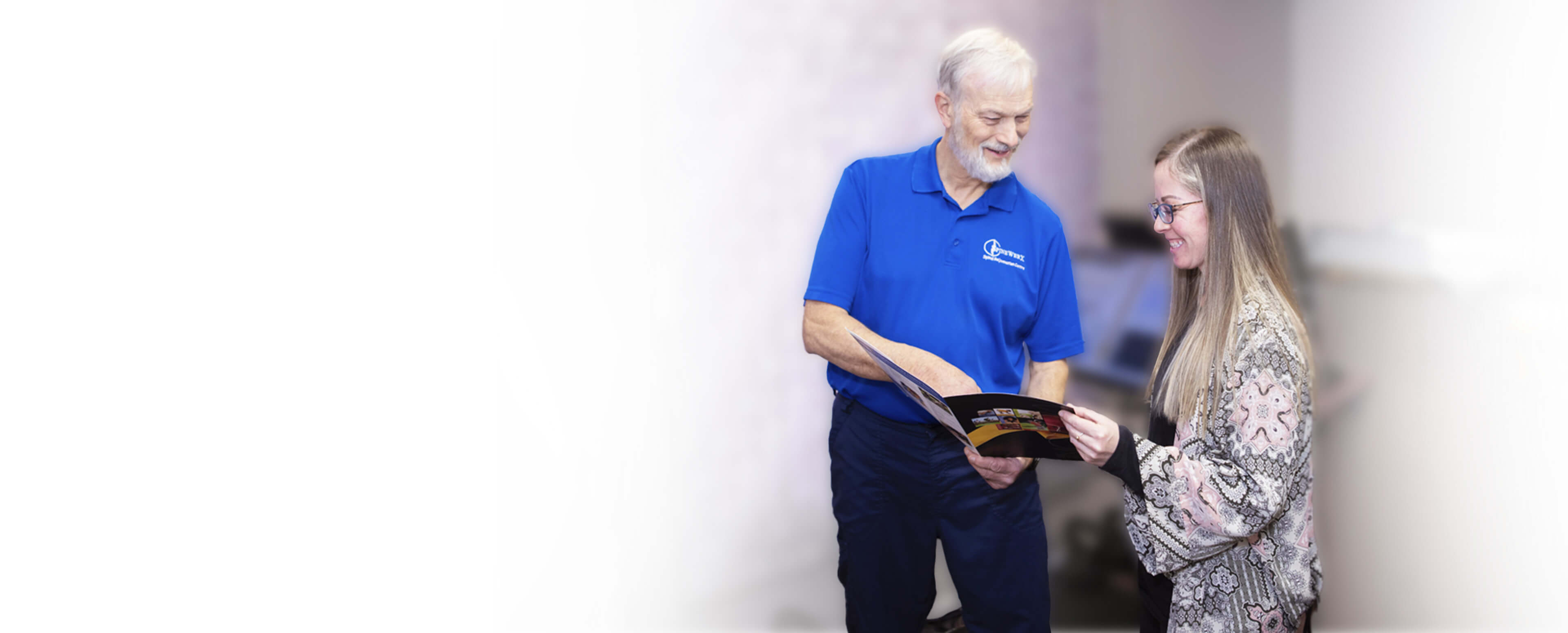 Lindsay chiropractor Dr Croutch showing patient a booklet