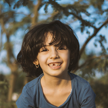 A child with missing teeth