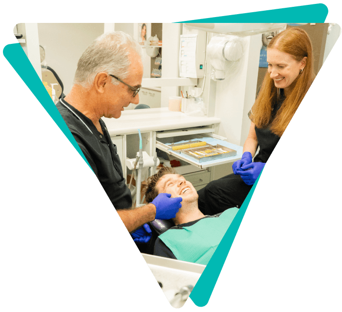 Dentist checking patient