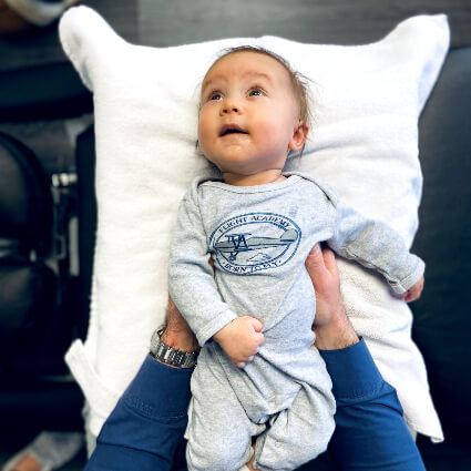 Cute baby getting adjusted